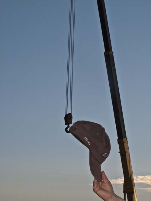 Anne finds a place to hang her hat at sunsrise in Morro Bay.